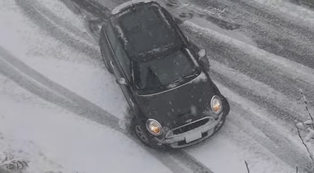 Car hits curb in Calgary
